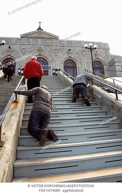 Pilgrims ascenting the steps to Saint Joseph's Oratory in Montreal