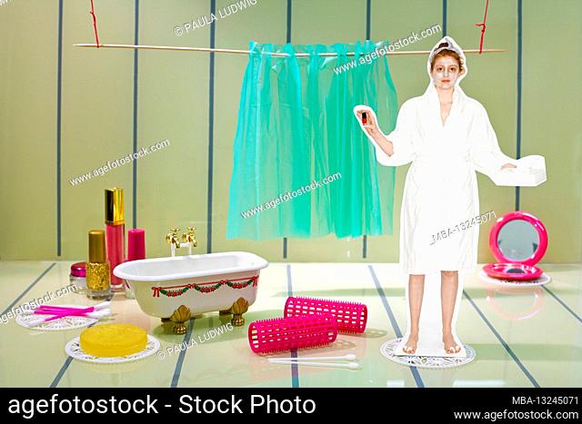 Woman in a bathrobe is standing in a stylized bathroom