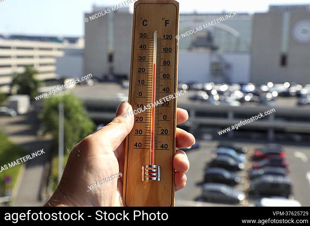 Illustration picture shows a thermometer, in XXX, Tuesday 19 July 2022. The Royal Meteorological Institute - KMI - IRM announces code red for heat in West...