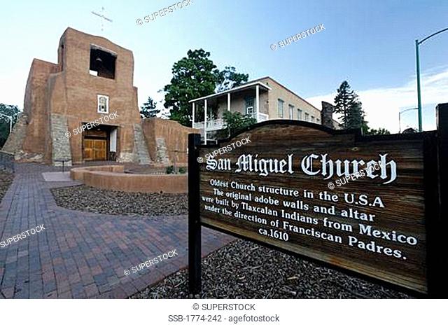 Signboard in front of a church, San Miguel Mission, Santa Fe, New Mexico, USA