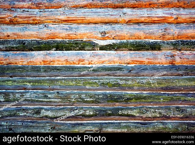 Vintage wooden logs wall background. Weathered wood texture