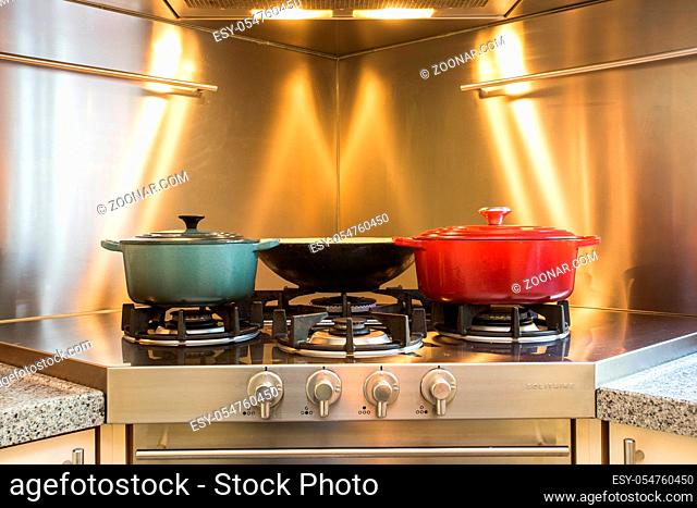 Elegant kitchen for workshop cooking in hotel have a equipment luxury and closeup pot on the gas stove which has fire. colorful