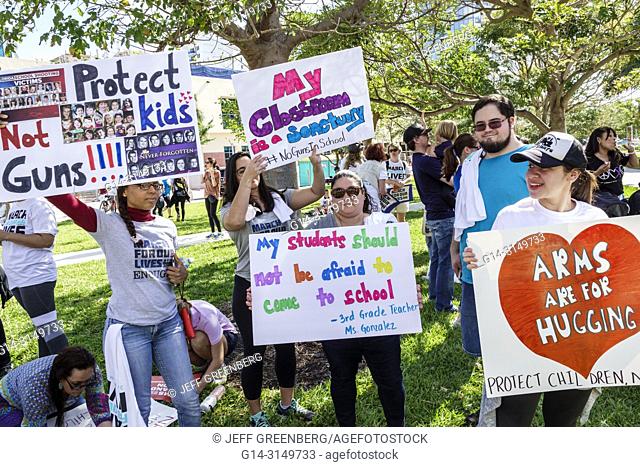 Florida, Miami Beach, Collins Park, March For Our Lives, public high school shootings gun violence protest, student, holding signs posters, teen, girl