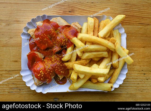 Currywurst with fries, Konnopke's Imbiss, Schönhauser Allee, Prenzlauer Berg, Pankow, Berlin, Germany, Europe