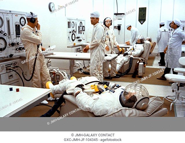 The three Apollo 10 astronauts suit up for a Countdown Demonstration Test at the Kennedy Space Center during preparations for their scheduled lunar orbit...