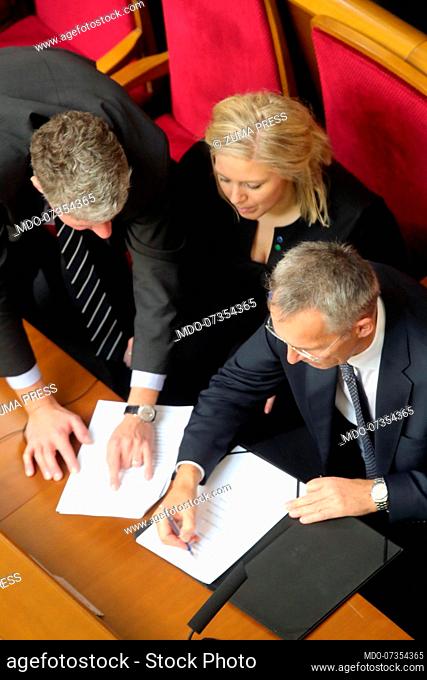 October 31, 2019, Kyiv, Ukraine: NATO Secretary General Jens Stoltenberg signs a document during the regular sitting of the parliament, Kyiv, capital of Ukraine
