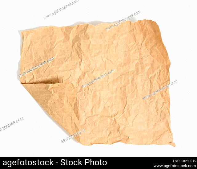 piece of brown parchment paper with torn edges isolated on white background, bend angle