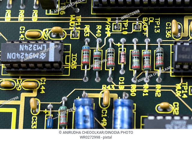 Electronic printed circuit board capacitors resistors IC