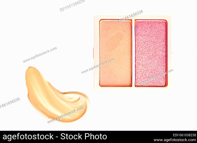 Eye shadow powder or blush makeup palette as flat lay, pink and orange cosmetic smear, eyeshadow and lip gloss isolated on white background