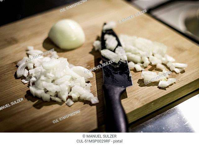 Chopped onions on cutting board