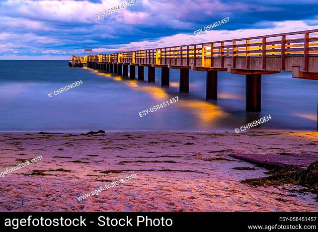 Seabridge at Schönberg at the East Sea in Germany in the evening