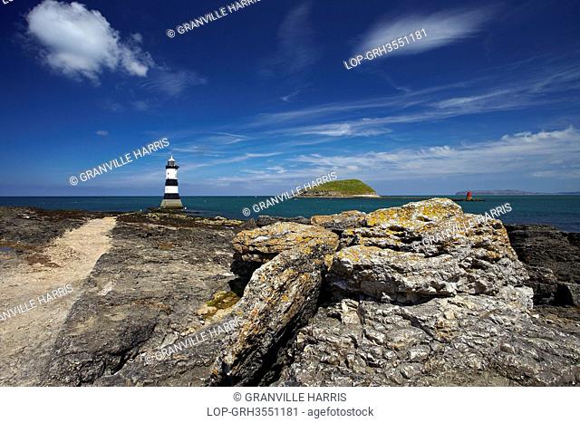 Wales, Anglesey, Penmon Point. Penmon Lighthouse, also known as Menai Lighthouse, at the north entrance to the Menai Strait opposite Puffin Island
