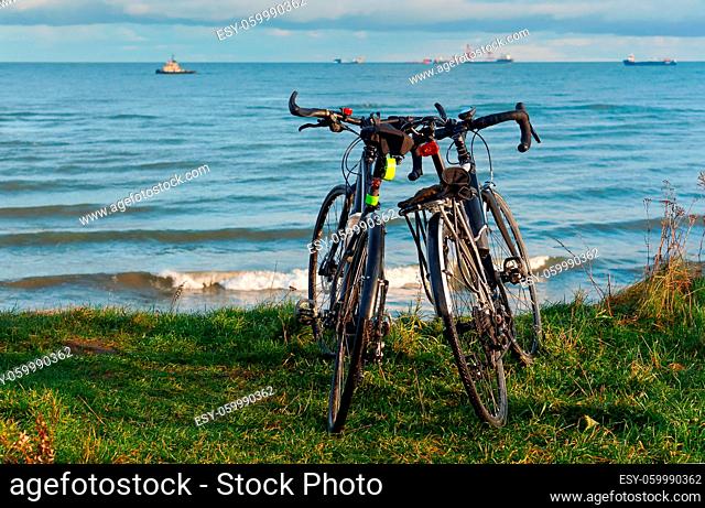 two bikes on the beach, two bikes on the coast