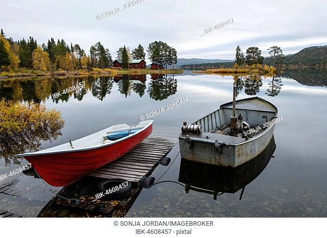 Boats at the lake, Autumnal landscape, Mirroring, Norrbottens, Norrbottens län, Laponia, Lapland, Sweden