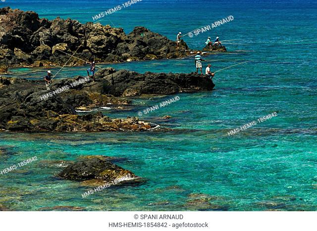 France, Ile de la Reunion (French overseas department), Saint Leu La Pointe au Sel, landscape of sea, fishermen on the rocks enjoying a sunny day