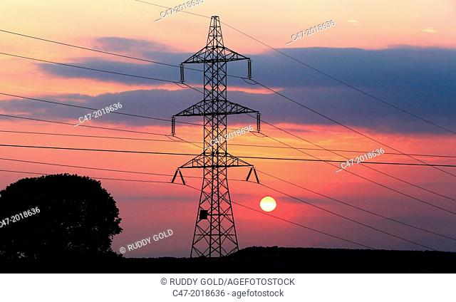 High Voltage electricity transmission tower, electricity pylon, at sunset taken near Sanahuja on the la Segarra area, Lleida province, Catalonia, Spain