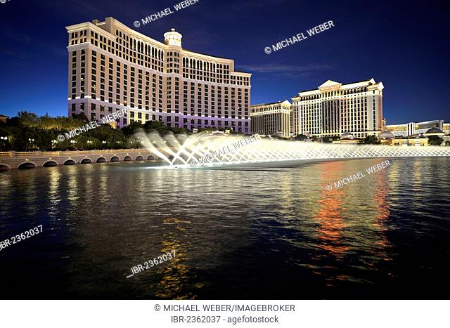 Night shot, trick fountains, Bellagio, Caesars Palace, The Mirage, luxury hotels and casinos, Las Vegas, Nevada, USA, PublicGround