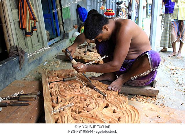 Carpenter makes furniture at Sherpur Bogra, Bangladesh September 2008