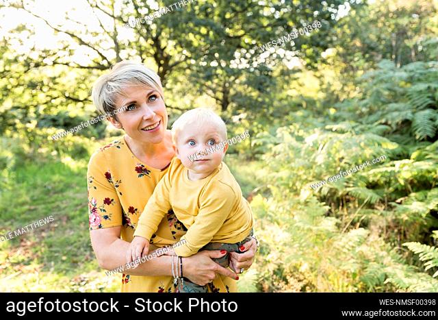 Portrait of mother and little son in nature