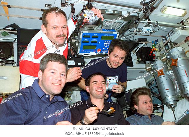 Astronauts Stephen N. Frick (bottom left), STS-110 pilot; Rex J. Walheim, mission specialist; cosmonaut Yury I. Onufrienko
