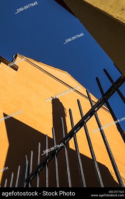 Stockholm, Sweden April 15, 2022 Building details with gate and shadow of chimney on Sodermalm on Duvnasgatan