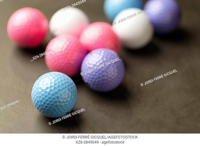 Coloured golf balls