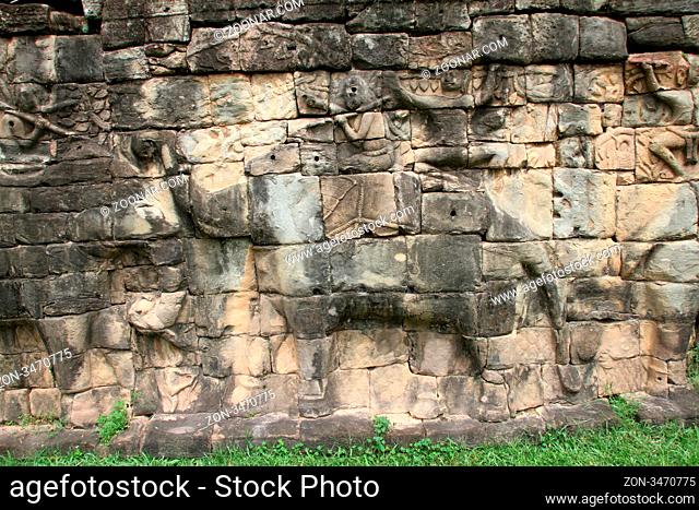 Elephants and figuras on the wall of Elephant terrace in Angkor, Cambodia