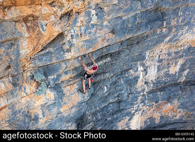 Climber climbing on a rock face, sport climbing, Telendos, near Kalymnos, Dodecanese, Greece, Europe