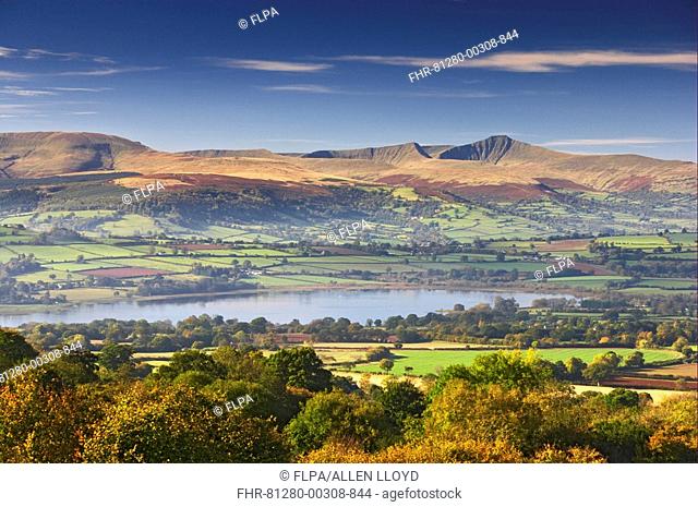 View of lake, farmland and hills, looking from Mynydd Llangorse, Llangorse Lake, Brecon Beacons N P , Powys, Wales, october