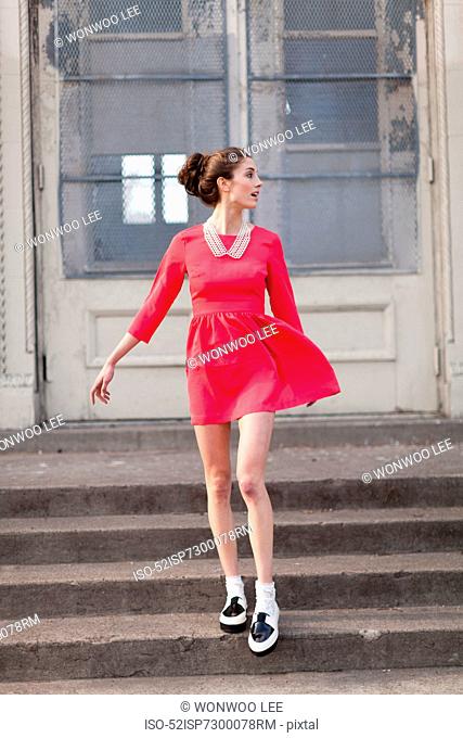 Woman walking on steps