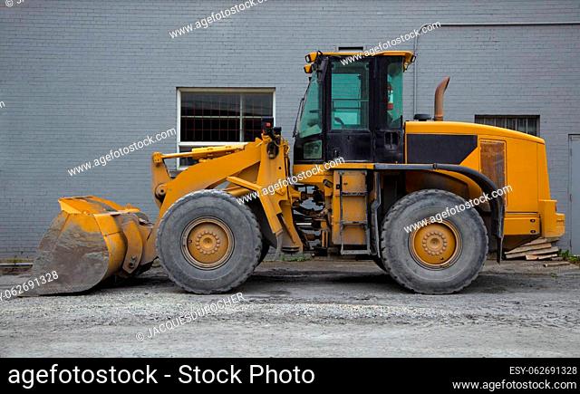tractor loader yellow excavator construction site heavy equipment hydraulic shovel