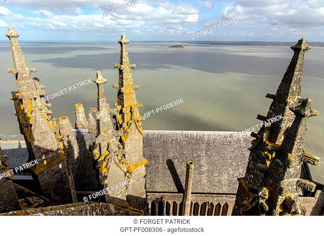 PINNACLES OF THE GOTHIC CHOIR WITH VIEW OF THE BAY, THE ABBEY OF MONT-SAINT-MICHEL (50), FRANCE
