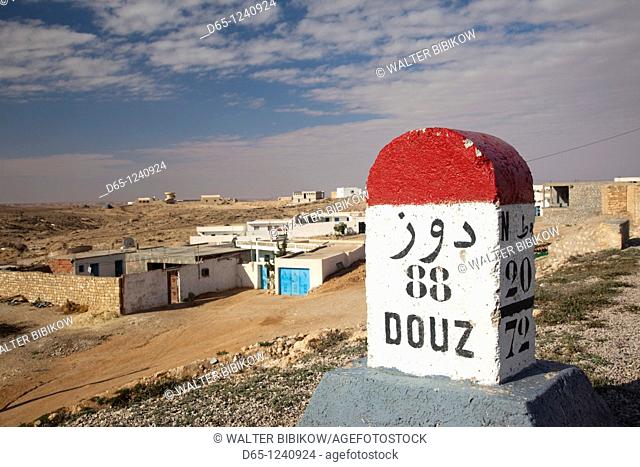 Tunisia, Ksour Area, Tamezret, road mileage marker to Douz, Route C 105