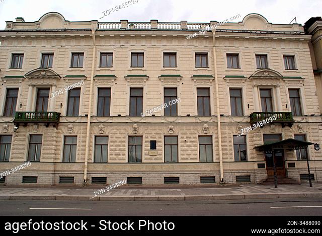 Facade with green balconies in St-Petersburg, Russia