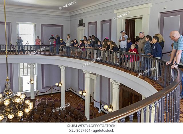 Montgomery, Alabama - A tour group visits the House of Representatives chamber in the Alabama State Capitol. The legislature now meets across the street in the...