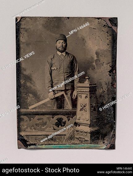 [Carpenter, Standing Behind a Decorative Balustrade, Holding a Square]. Artist: Unknown (American); Date: 1870s; Medium: Tintype; Dimensions: Image: 8