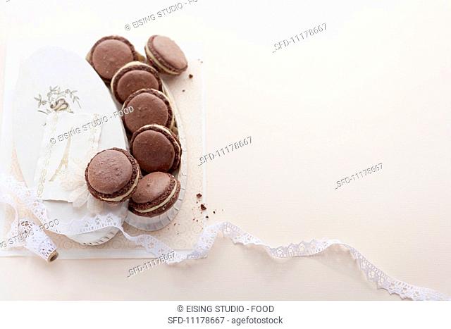 Chocolate macaroons with creamy almond filling