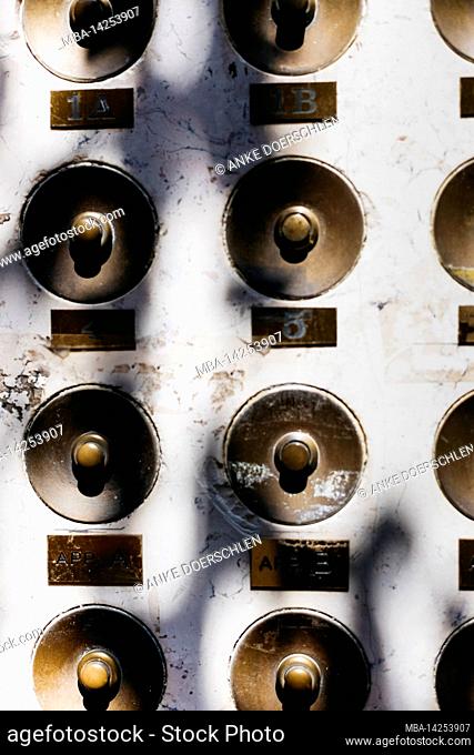Old bell buttons on a house wall in the old town of Venice, Italy