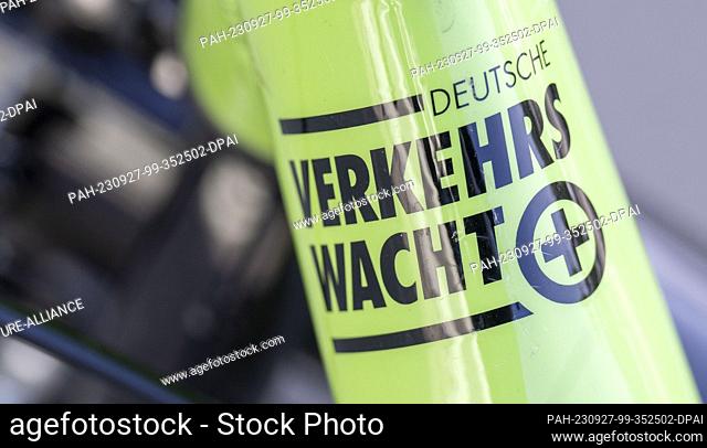 27 September 2023, Saxony, Hohenstein-Ernstthal: The logo of the traffic watch can be seen on a bicycle. To increase the safety of children in road traffic