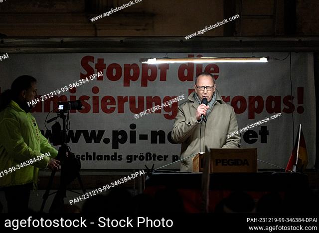 18 December 2023, Saxony, Dresden: Jörg Urban, Chairman of the AfD Saxony, speaks at a rally of the right-wing extremist movement Pegida on Schlossplatz