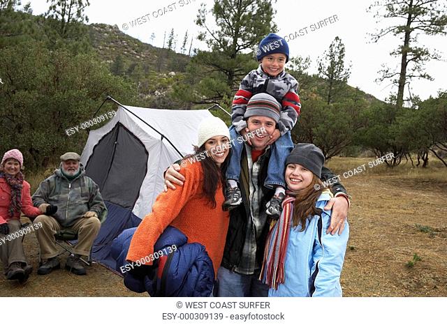 Family with children 7-12 camping portrait