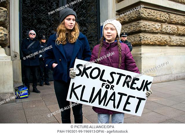 01 March 2019, Hamburg: Luisa Neubauer (l), German climate activist and one of the main organisers of the school strike Fridays for Future, and Greta Thunberg
