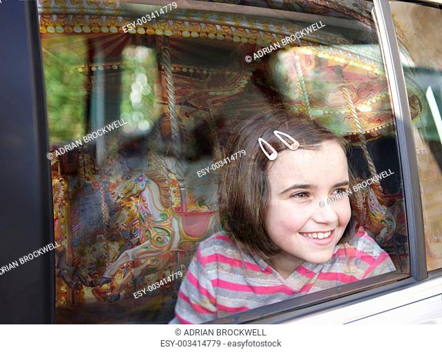 Girl and car window