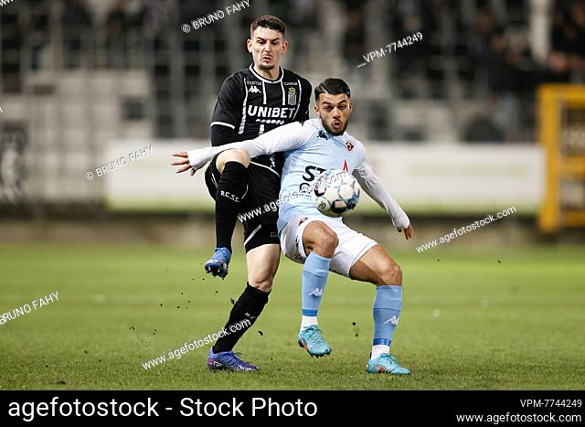 Charleroi's Stefan Knezevic and Seraing's Georges Mikautadze fight for the ball during a soccer match between Sporting Charleroi and RFC Seraing