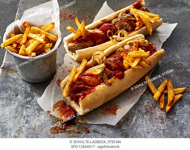 Hot dogs with curried sausage and chips
