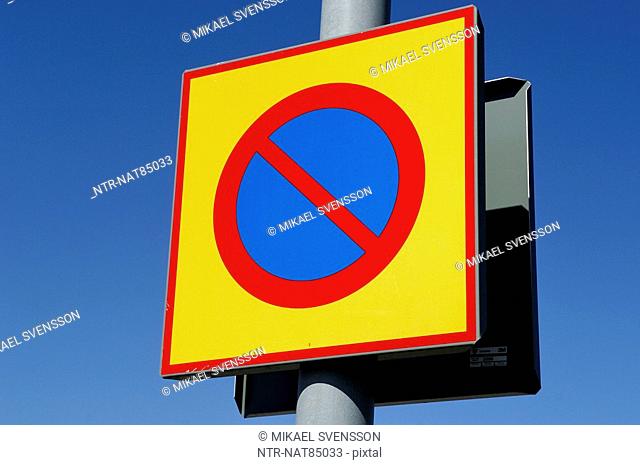 Traffic signs against a blue sky, Sweden