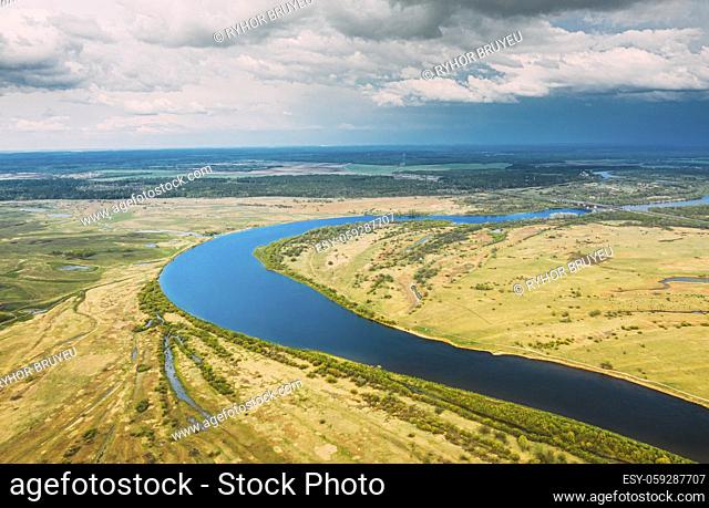 Rechytsa, Gomel Region, Belarus. Aerial View Of Dnieper River. Sky Above Green Meadow And River Landscape. Top View Of European Nature From High Attitude In...