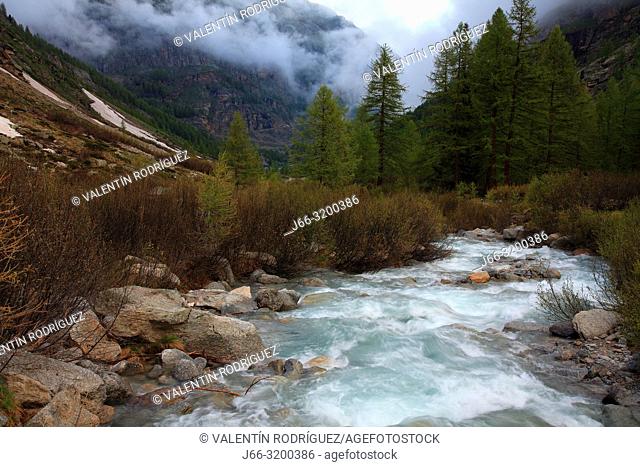 Landscape at the head of the Valsavarenche valley with the Savara river at the end of the spring. National Park Gran Paradiso. Italy