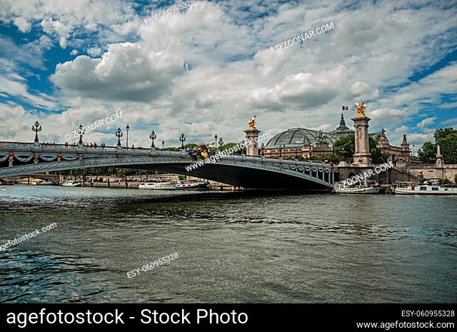 Alexandre III bridge, Grand Palais building and boats anchored at Seine River bank in Paris. Known as the ?City of Light?