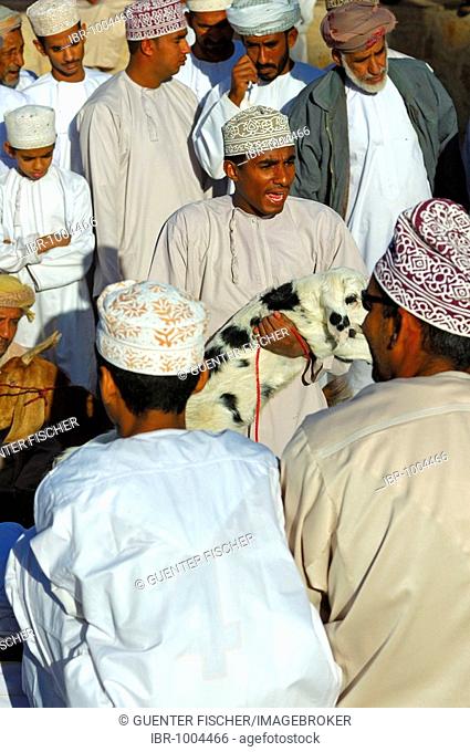 Tradesmen on the goat market, Nizwa, Sultanate of Oman, Middle East